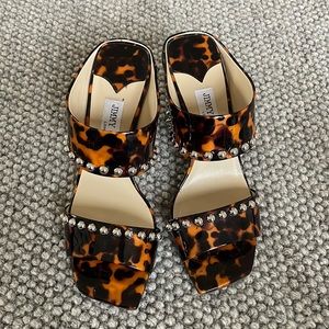 Jimmy Choo
Matty 85mm stud-embellished sandals.